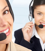 Call center employees using telephone equipment